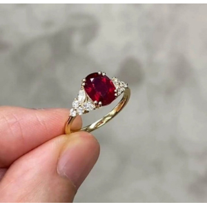 1.50 Carat Oval Shaped Ruby Ring With Marquise & Round Diamond Set