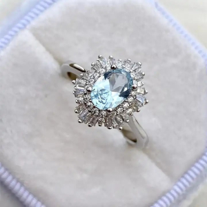 2.00 Carat Oval Shaped Aquamarine With Baguette And Round Diamond Set Engagement Ring