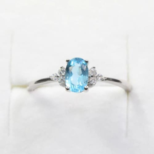 0.80 Carat Oval Shaped Aquamarine With Round Natural Diamond Sidestone Engagement Ring