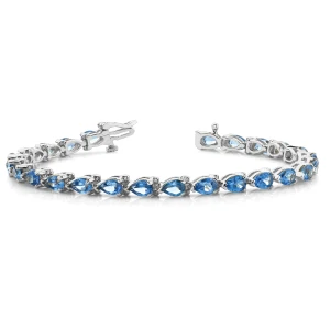 Vega Blue Topaz White Gold 3 Prong Set  Bracelet