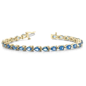 Vega Blue Topaz Yellow Gold 3 Prong Set  Bracelet