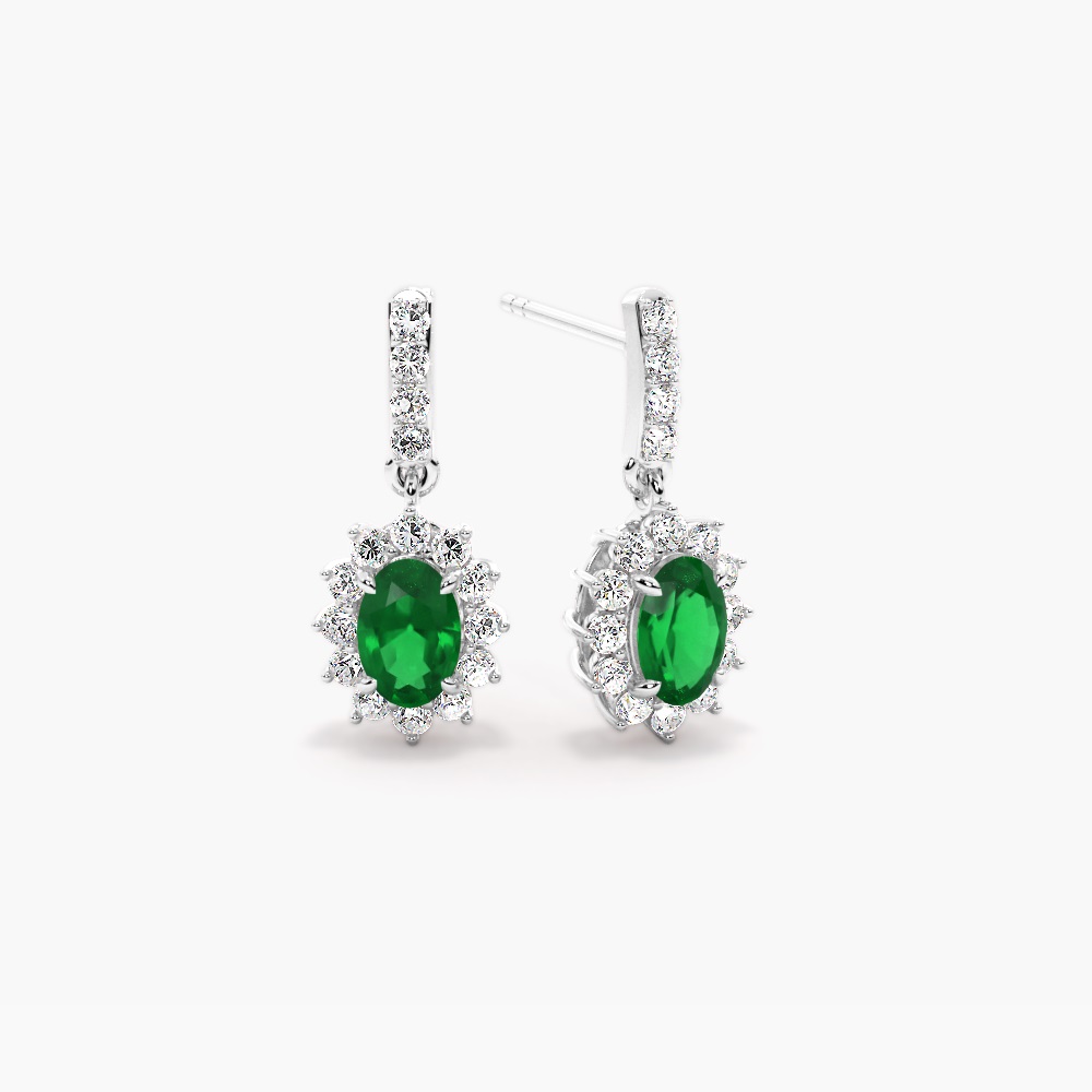 0.50 Carat Oval Shaped Emerald Earrings With Diamond Set