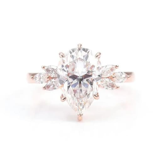 0.2 Ct Lab-Created Diamond Pear Cut Coral  Side Stone Engagement Rings in 18K White Gold