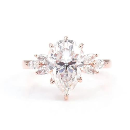 0.20 - 3.00 Carat Pear Cut Solitaire Engagement Ring with Marquise and Round Side Diamonds