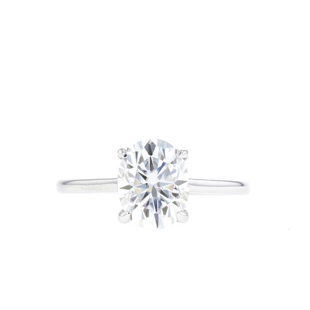 Oval Cut 4 Claw Solitaire Engagement Ring