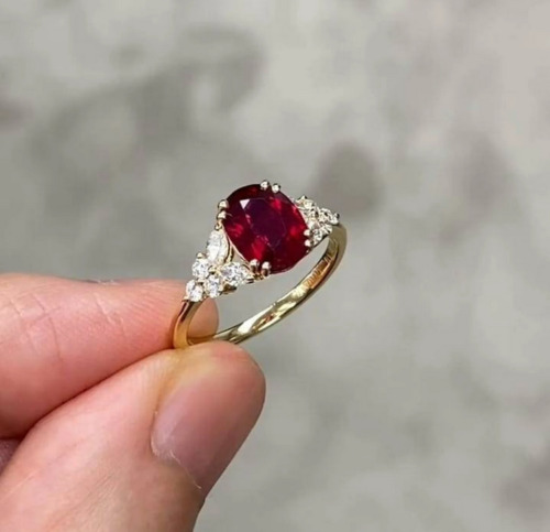 1.50 Carat Oval Shaped Ruby Ring With Marquise & Round Diamond Set