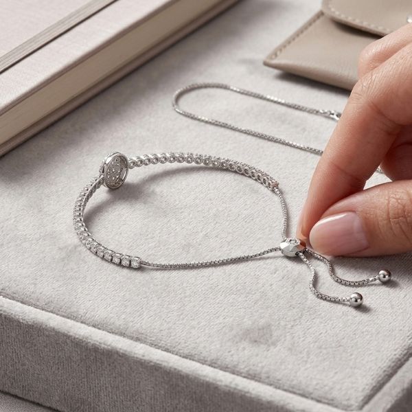 women wearing a white gold diamond friendship bracelets